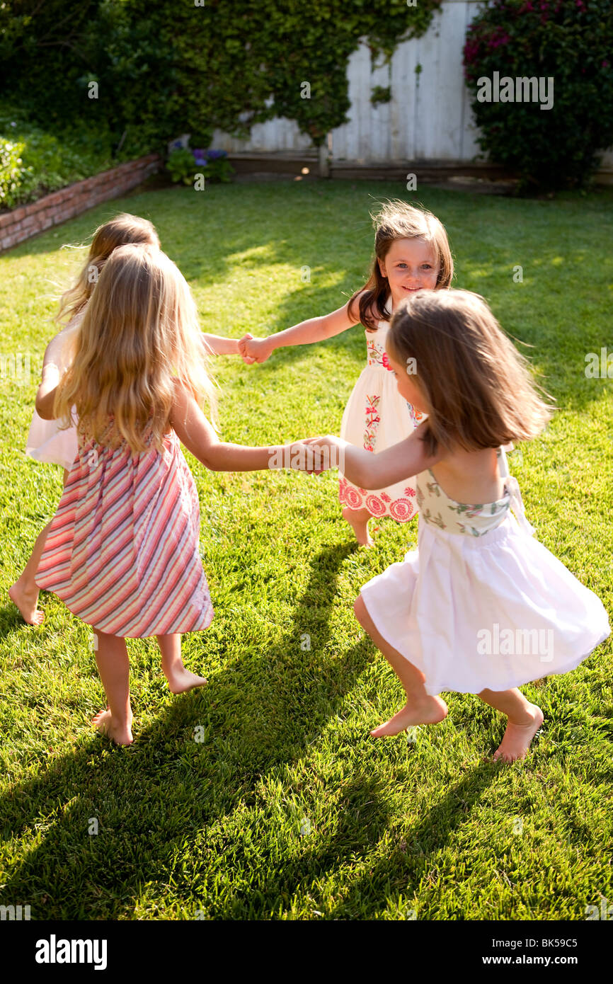 Young Girls Playing Ring Around The Rosie Stock Photo Alamy