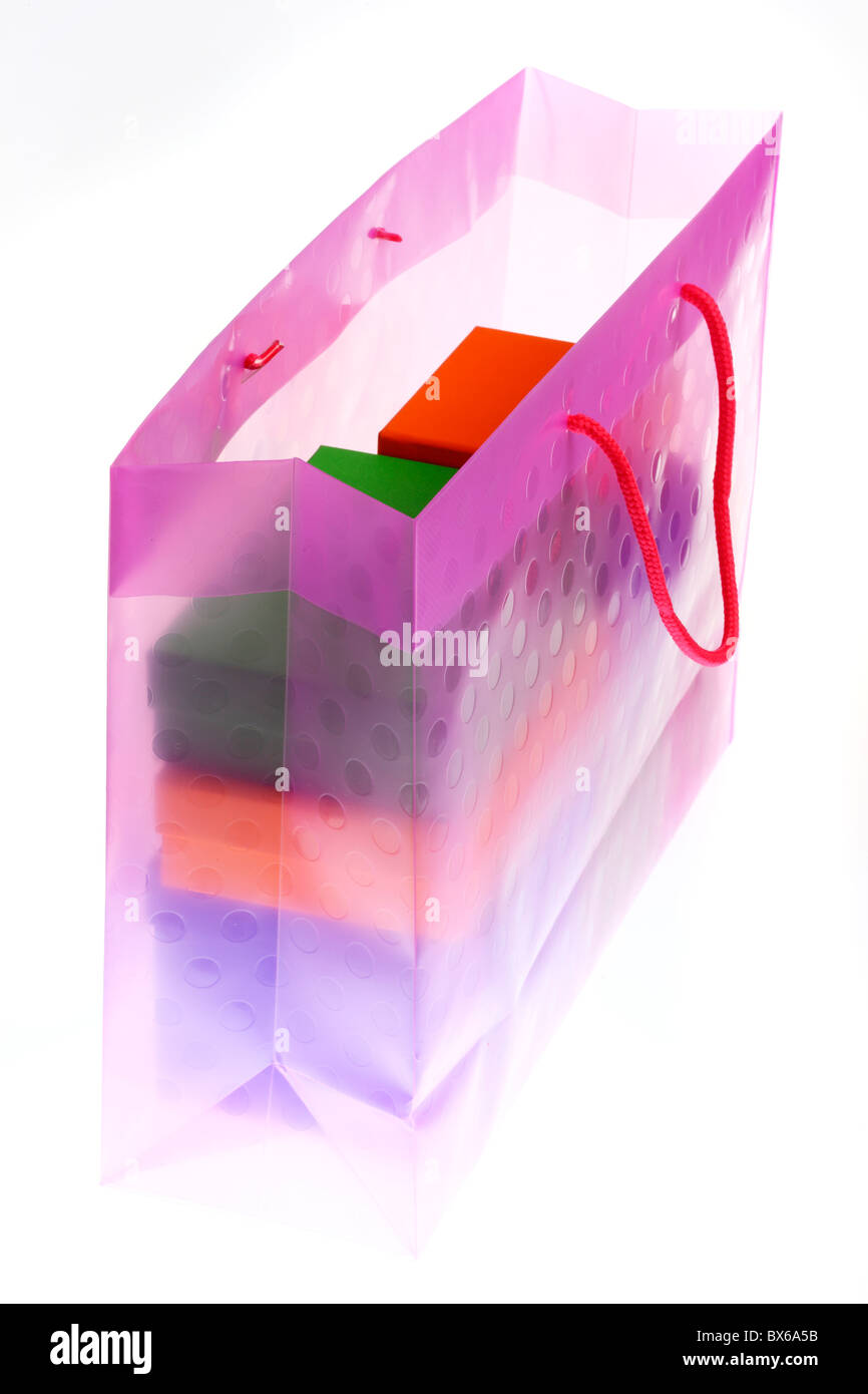 Colorful, transparent, plastic gift bags, filled with cardboard boxes ...