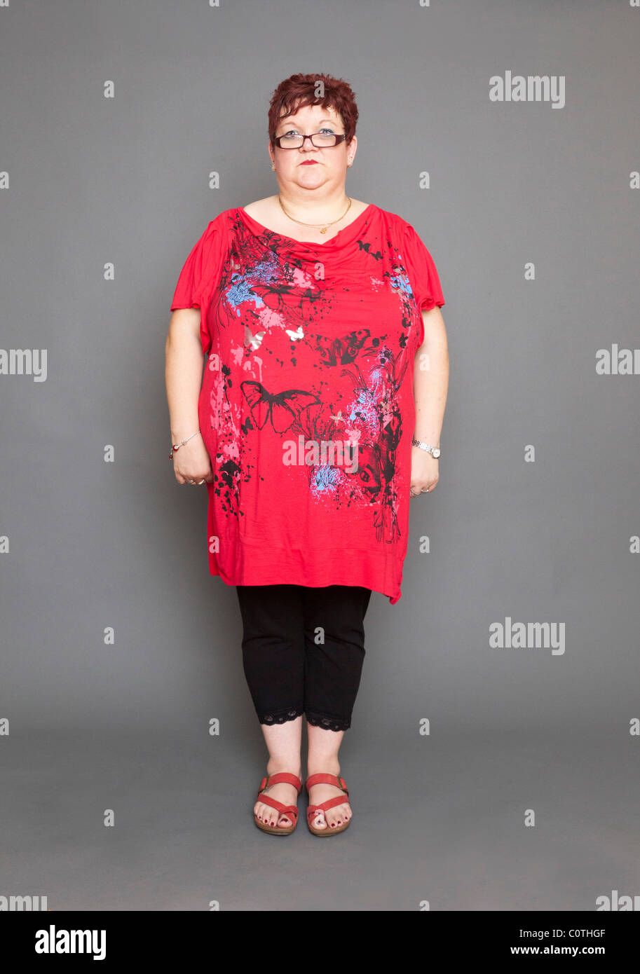 overweight woman standing upright Stock Photo Alamy