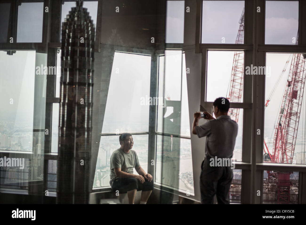 Chinese tourists in the observation deck, on 88th floor, of the Jinmao ...