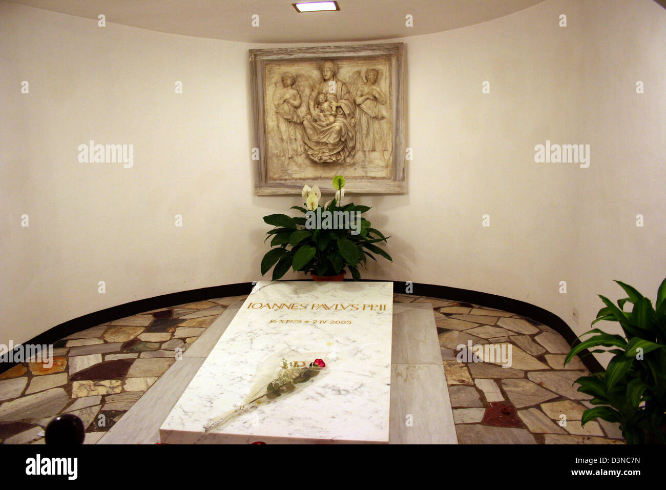 The picture shows the tomb of Pope John Paul II in the Vatican grottos