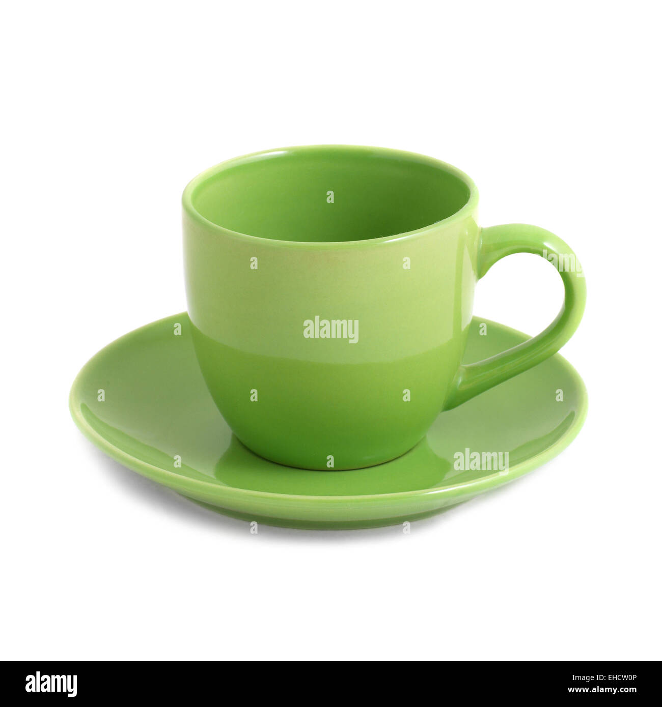 Green teacup and saucer isolated on white Stock Photo - Alamy