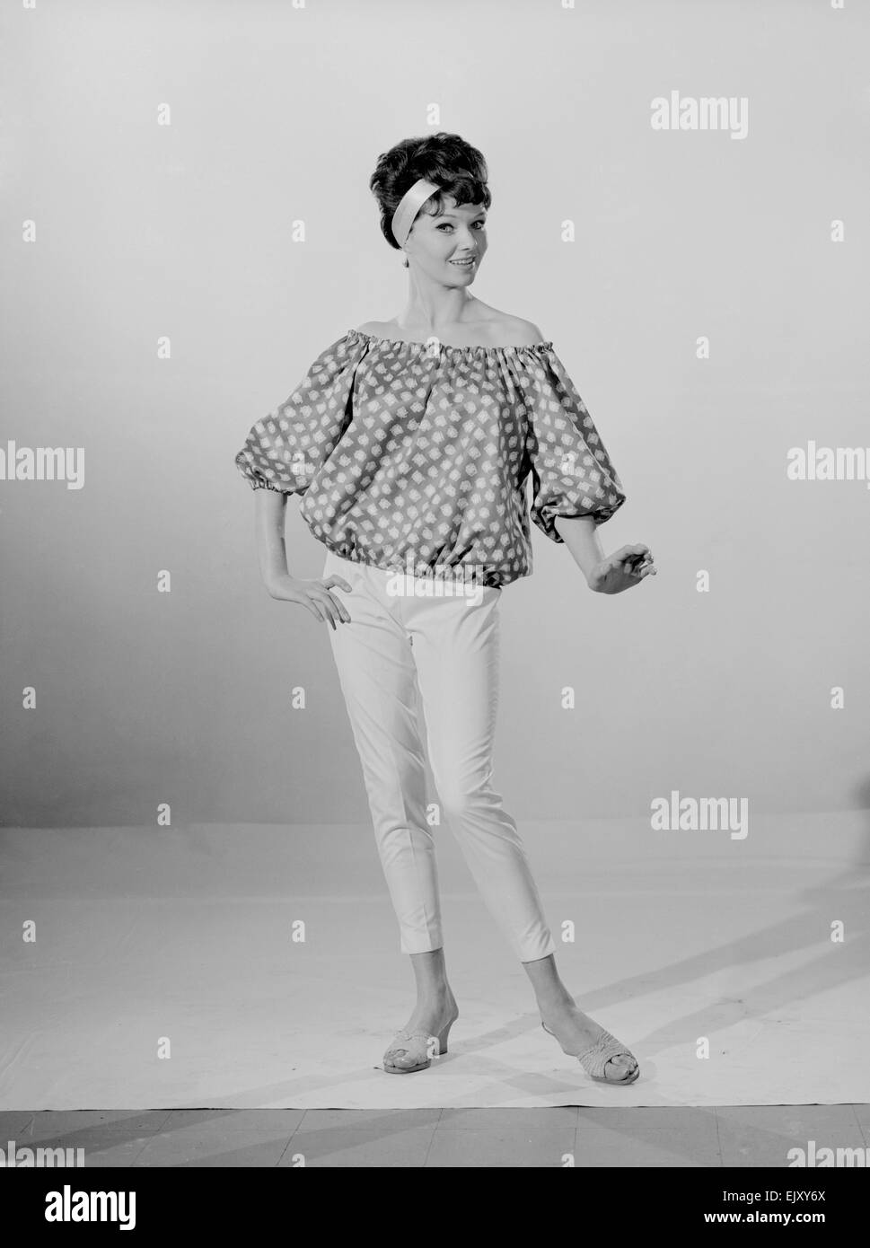 Reveille Model Meriel Weston modelling a spotted blouse May 1961 Stock ...