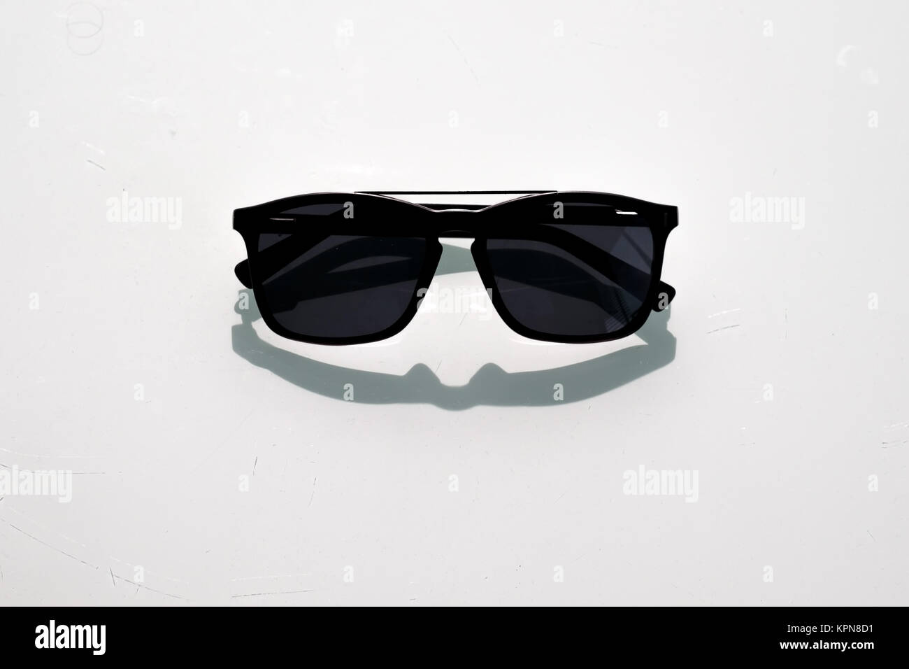 black sunglasses on white background Stock Photo - Alamy