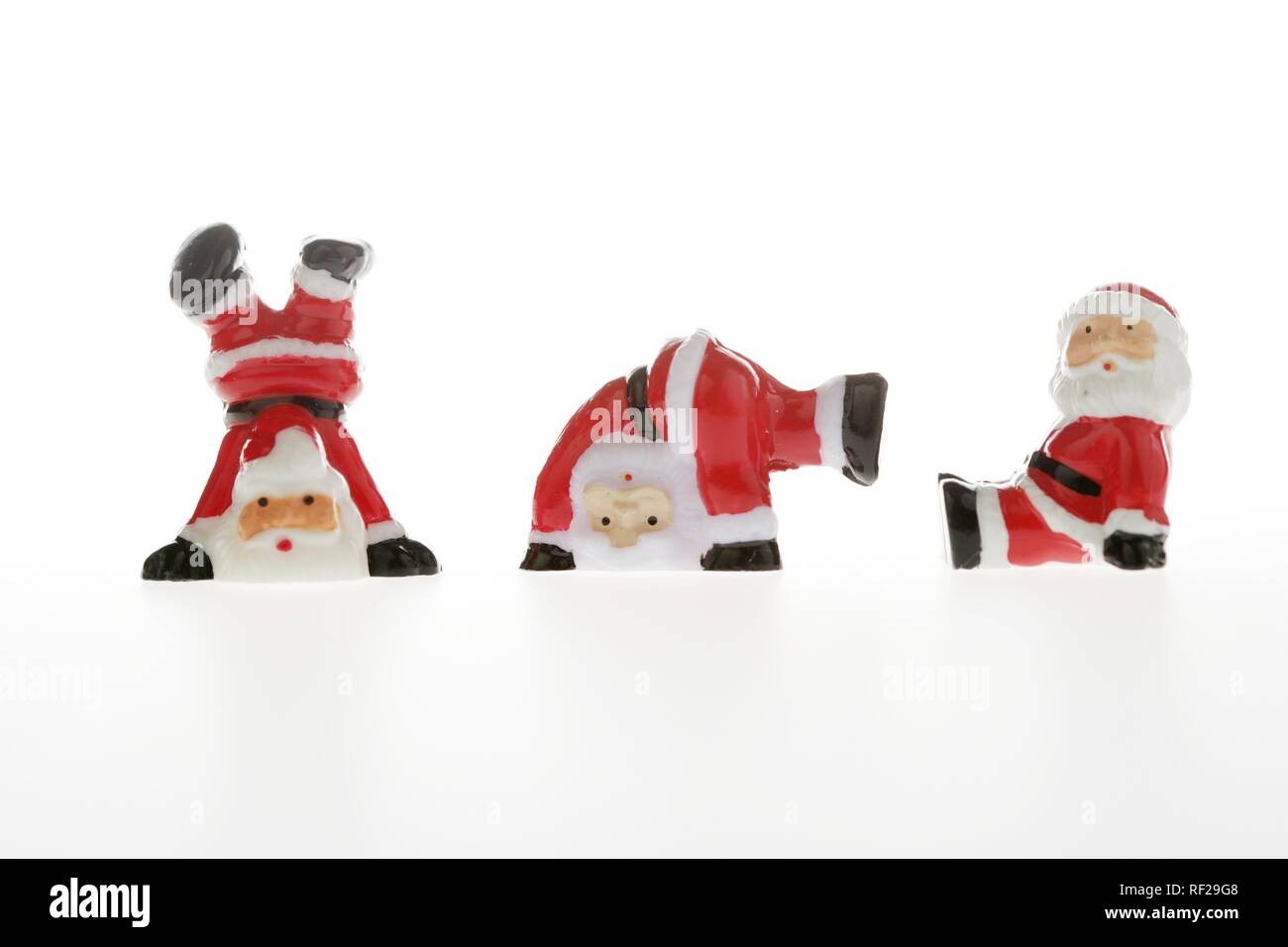 Plastic Santas doing cartwheels Stock Photo - Alamy