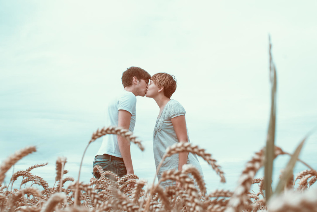 Young couple in a corn field