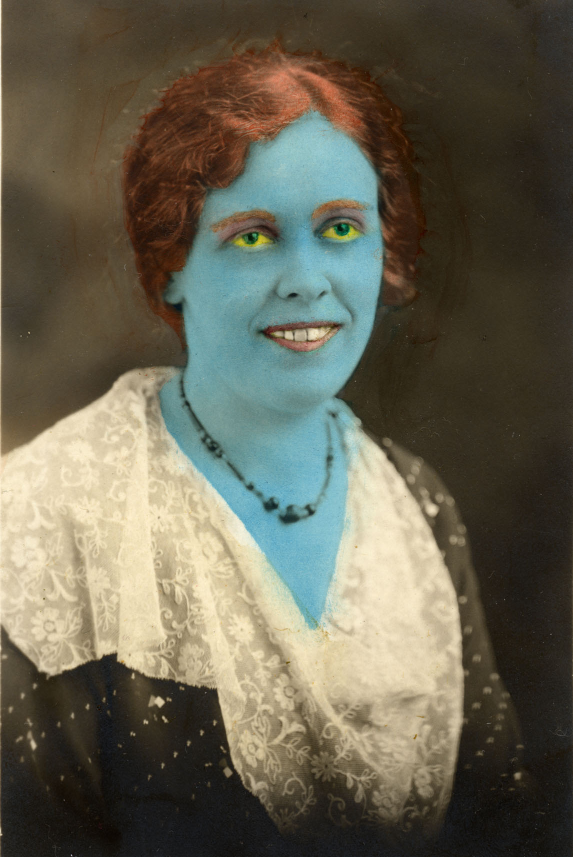 Ghastly Blue Woman in Elegant Dress. Image shot 1910. Exact date unknown.